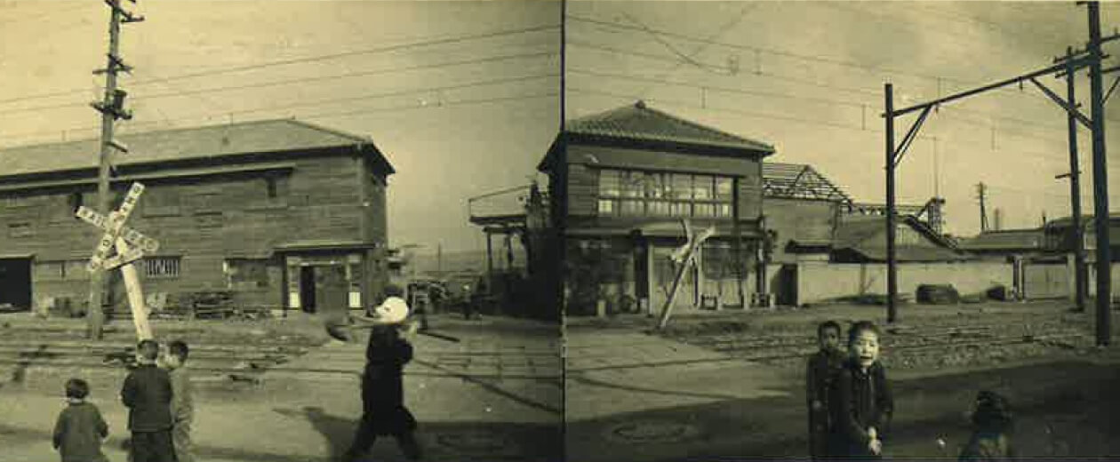 写真左が寮、右が事務所、奥に工場